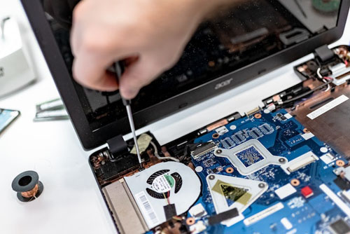 Technician Repairing Acer Laptop