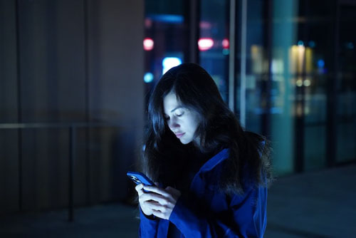 Woman Texting Using Smartphone