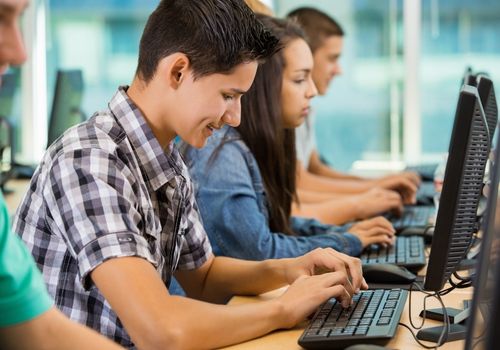 High school students at a computer lab