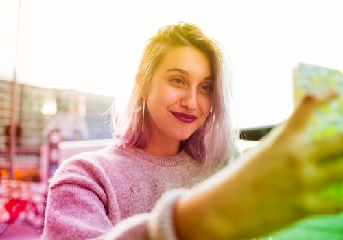 Woman Taking Selfie in Outdoor