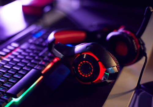 Gaming Headset Lying on Computer Table