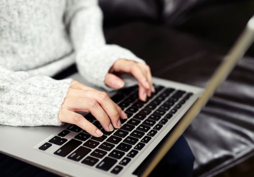 Woman Working on a Laptop