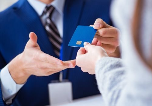 Lady Making Payment Using Debit Card