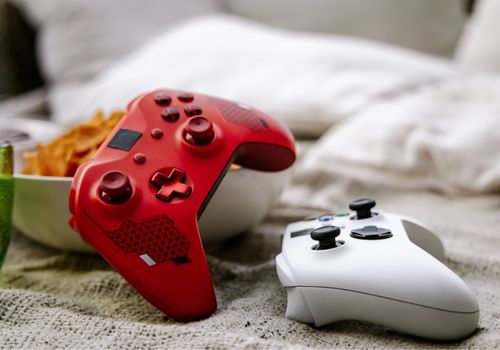 Red and White Color Wireless Xbox Controllers