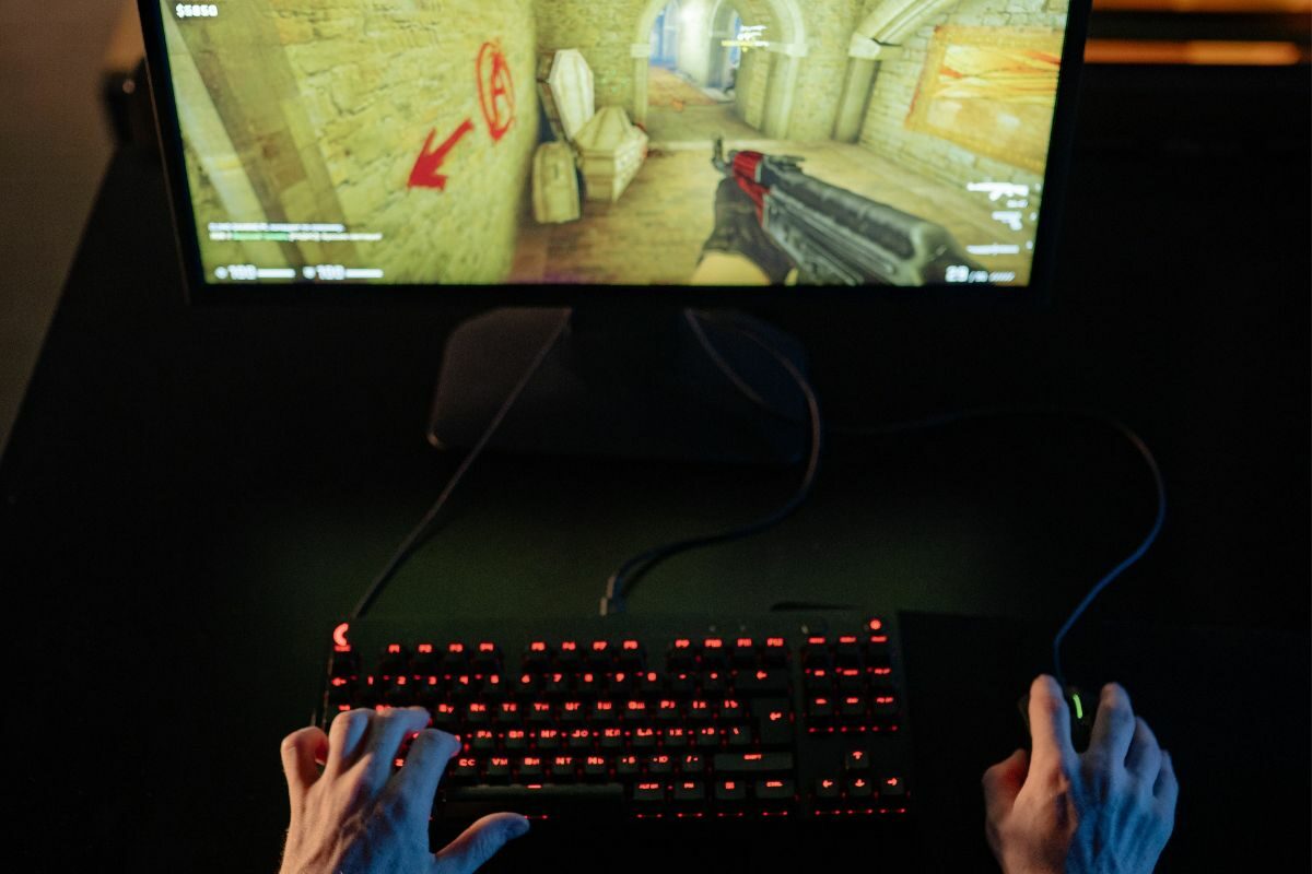 A Person Playing a Video Game in a Computer