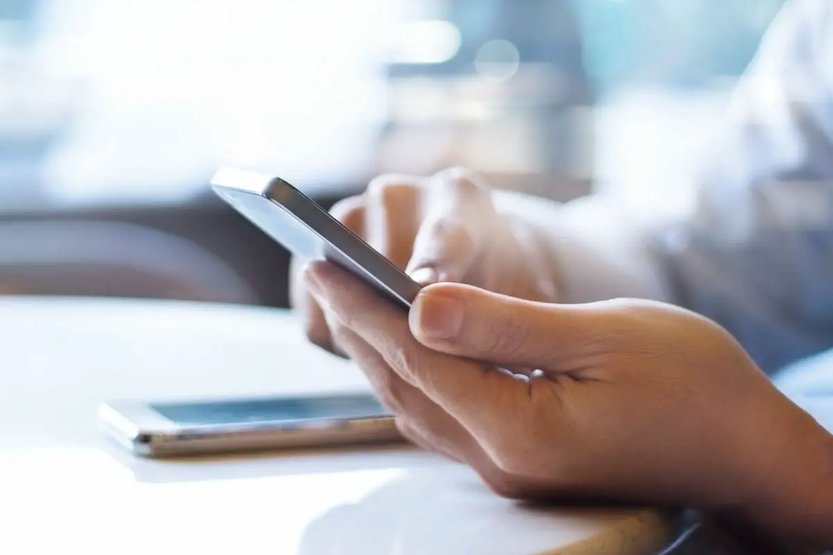 Businessman Using Mobile Payment Facilities