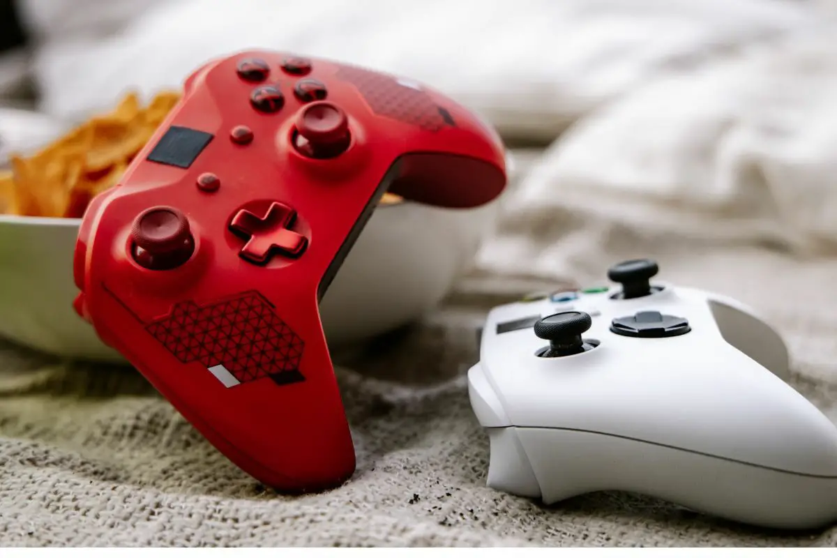 Red and White Xbox Wireless Controllers