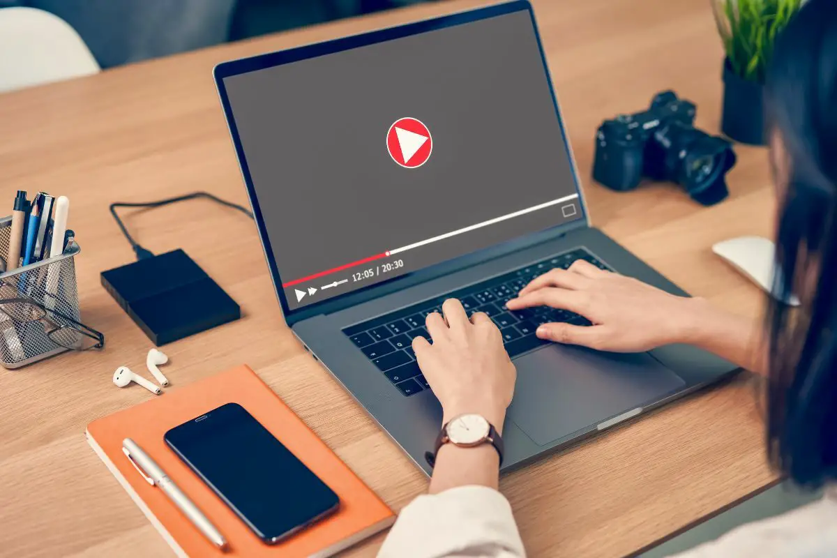 Woman Streaming Video on Laptop