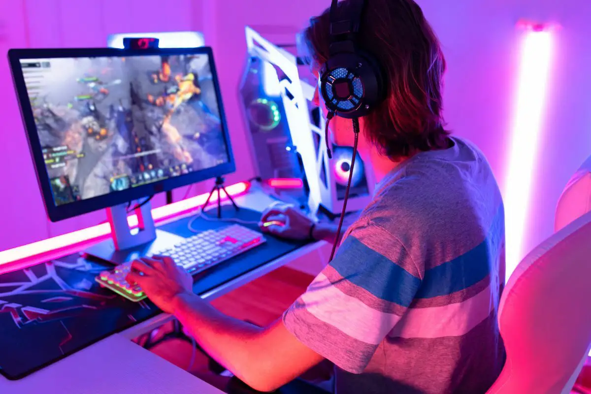 Young Man Playing Online Game While Streaming