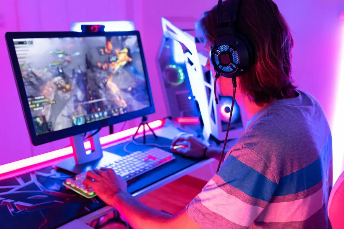 Young Man Playing Online PC Games