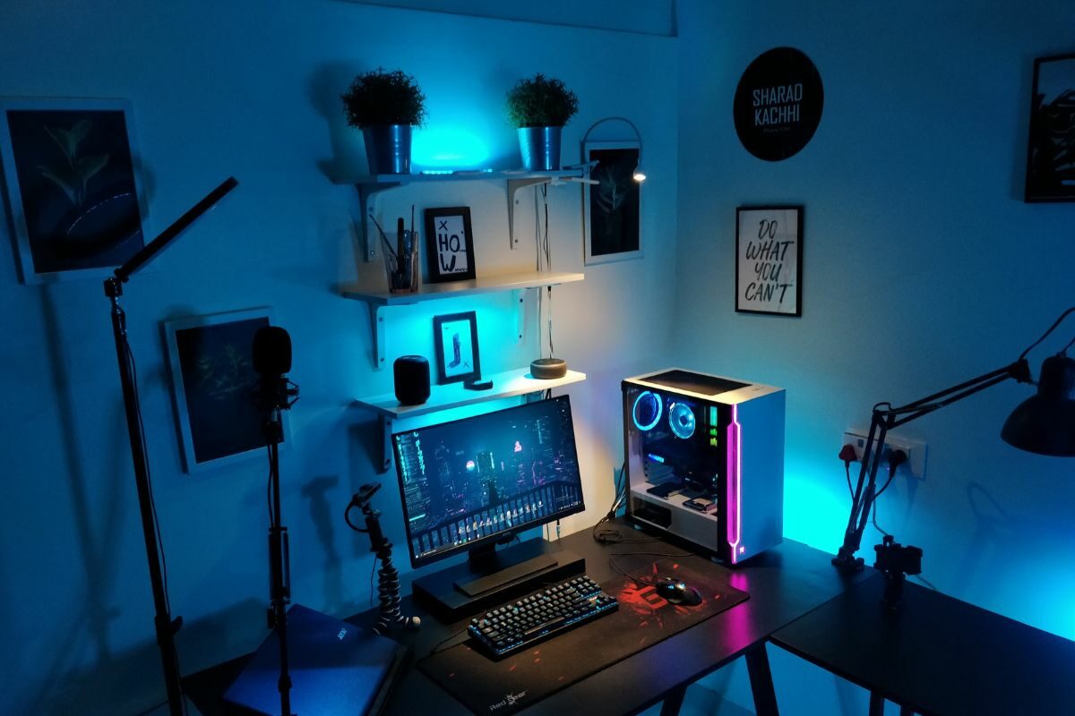 Blue Lit Room with Gaming PC Setup