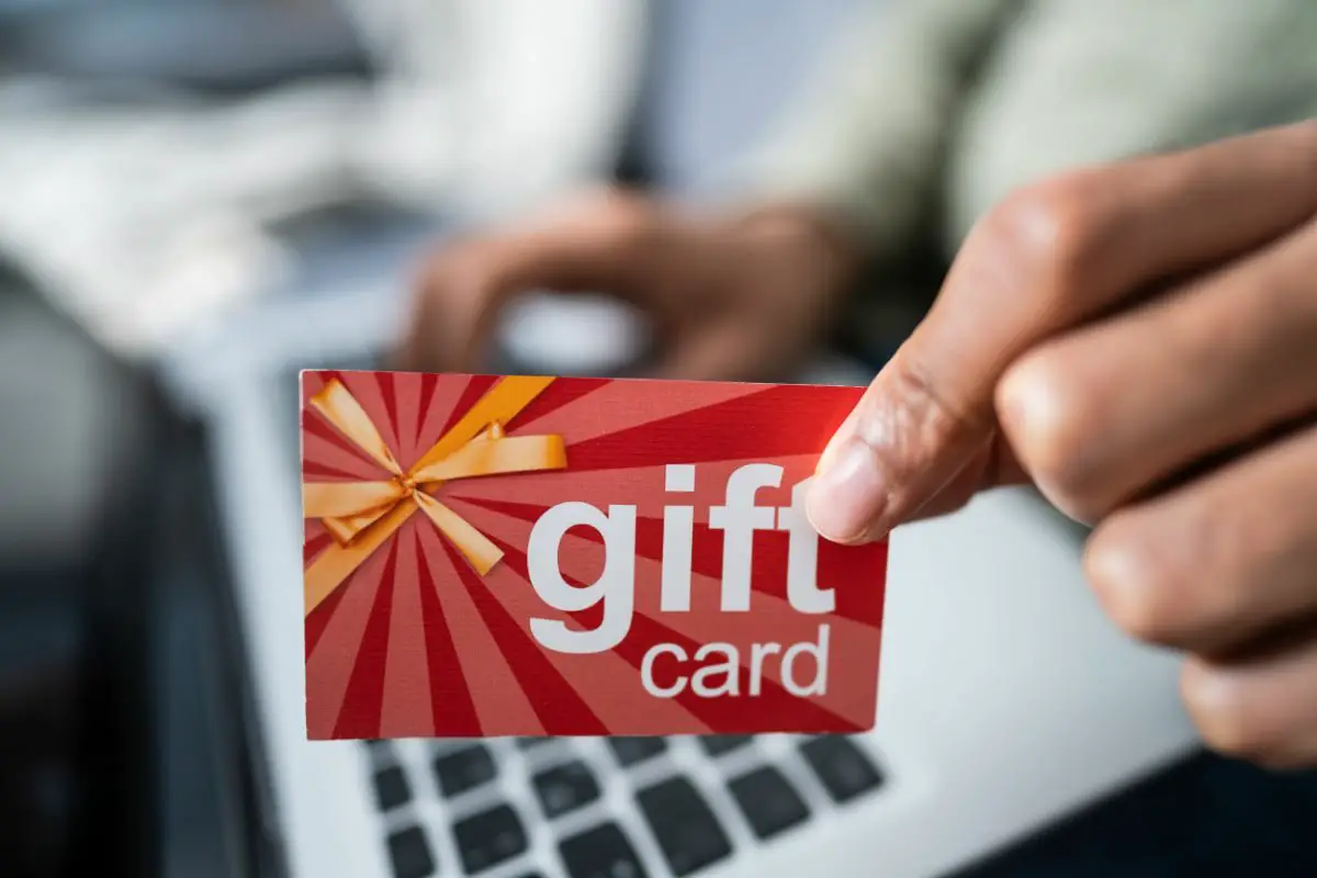 Business Person Holding a Gift Card