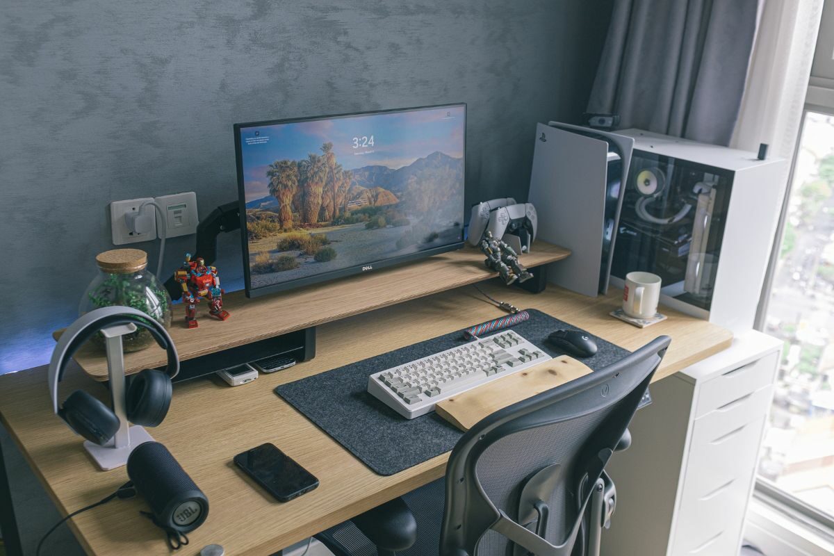 Desk Arranged with Gaming Equipment