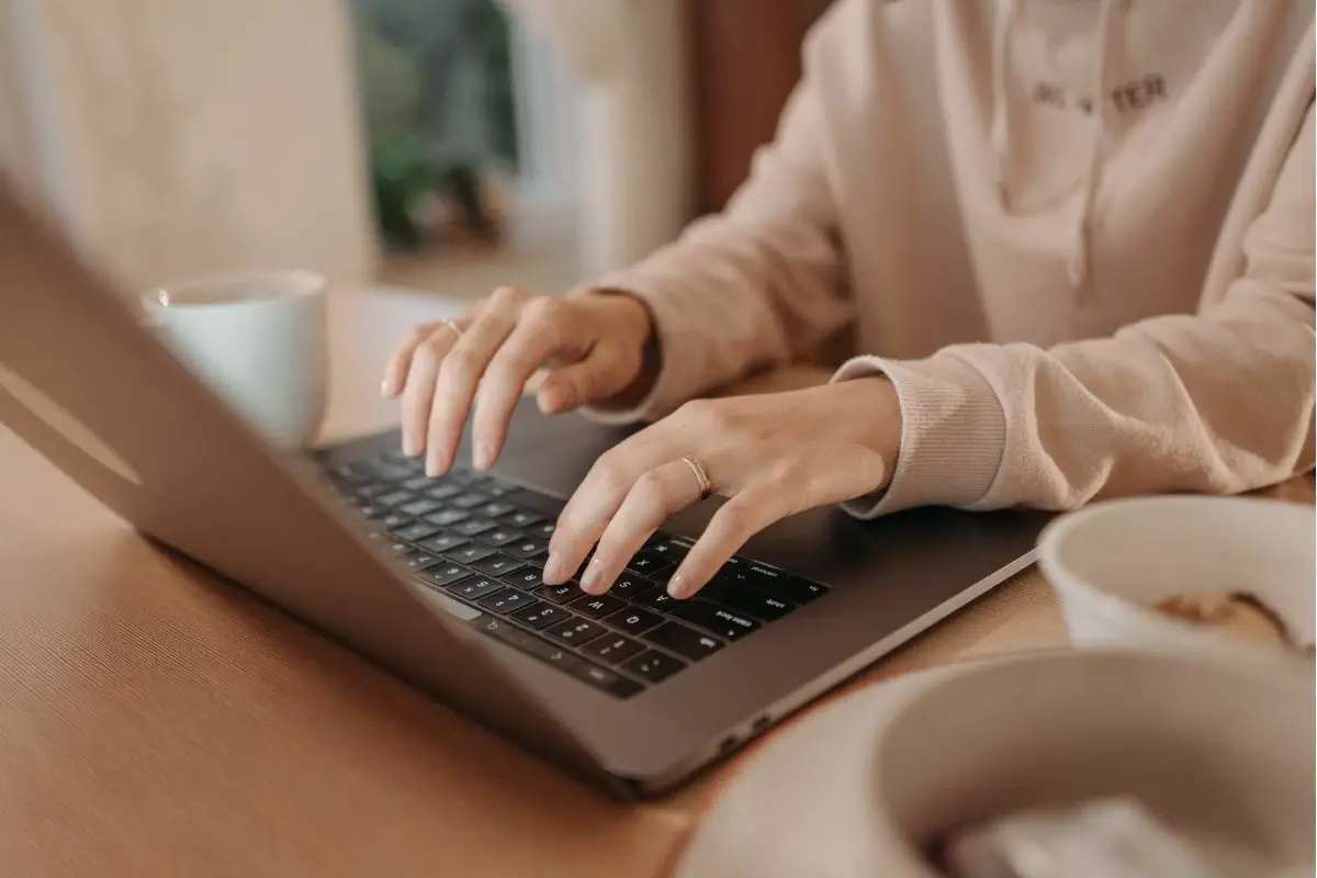 Person Typing on the Laptop