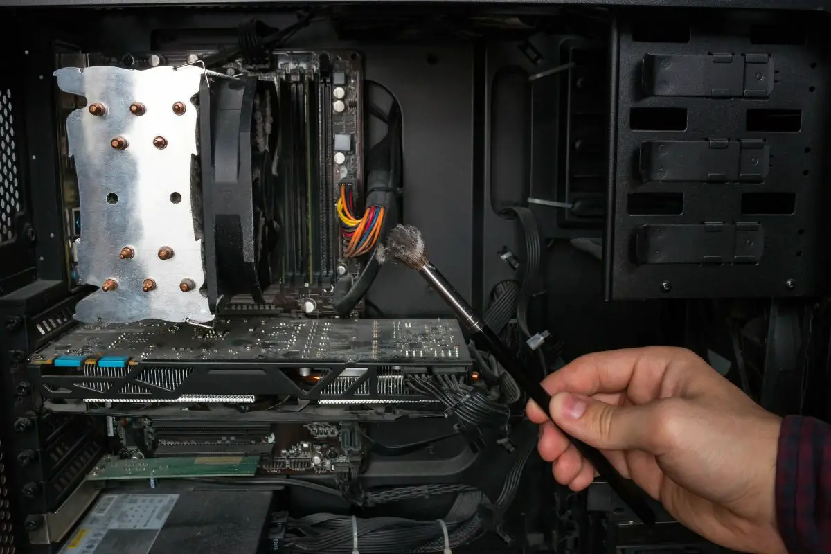 Cleaning the Inside of a PC with a Small Brush