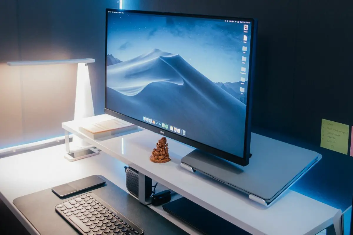 Computer Monitor with Keyboard and Mouse on Office Desk