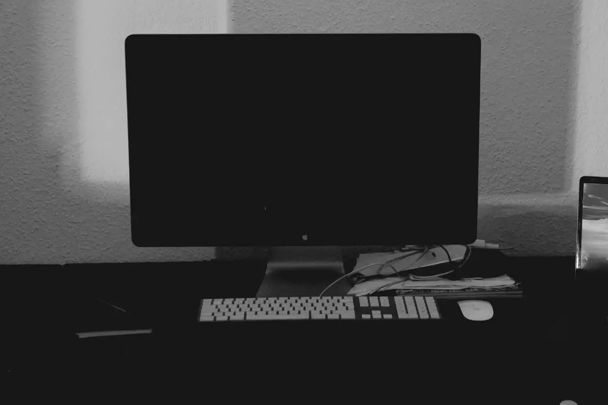 Turned Off Computer Monitor on a Desk