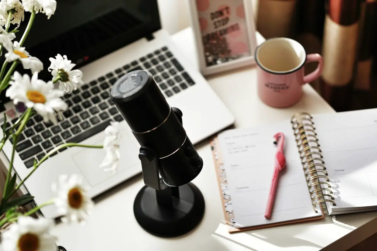 Black Microphone and Laptop on the Office Table