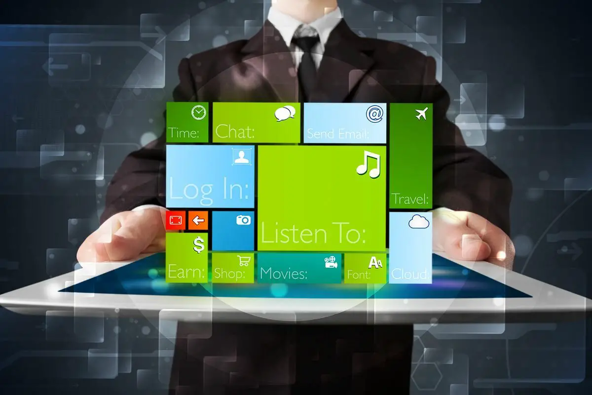 Businessman Holding a Tablet with Modern Software Operational System