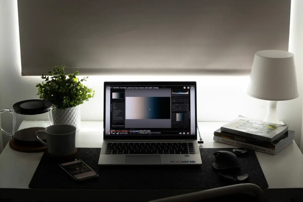 Silver Laptop on the Wooden Table